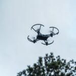 A drone captured in mid-flight against a clear sky in Istanbul, Turkey.